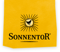 Sonnentor logo on a vibrant yellow background featuring a sunburst design for organic and sustainable products.